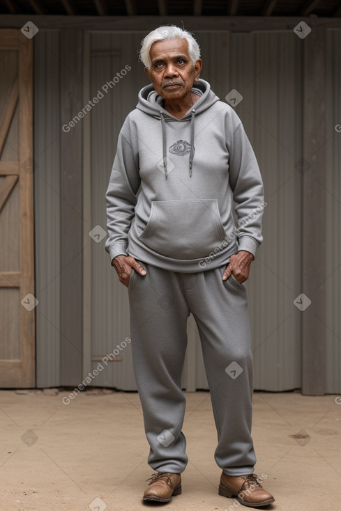 Sri lankan elderly non-binary with  gray hair