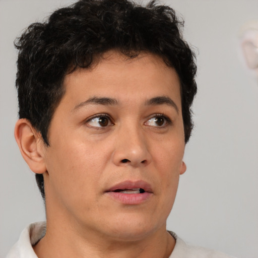 Neutral asian young-adult male with short  brown hair and brown eyes