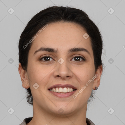 Joyful white young-adult female with medium  brown hair and brown eyes