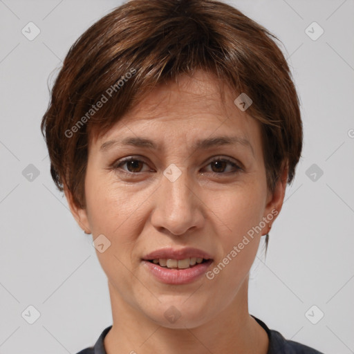 Joyful white adult female with short  brown hair and brown eyes