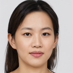 Neutral asian young-adult female with medium  brown hair and brown eyes