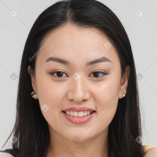 Joyful asian young-adult female with long  brown hair and brown eyes