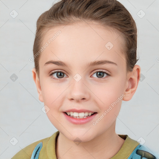 Joyful white child female with short  brown hair and grey eyes