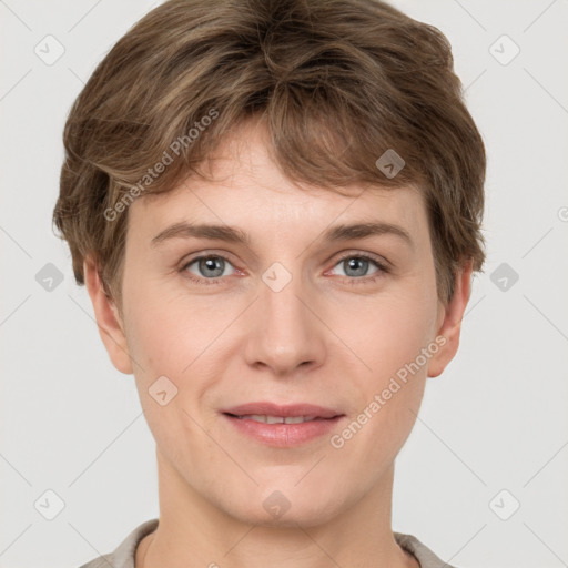 Joyful white young-adult female with short  brown hair and grey eyes