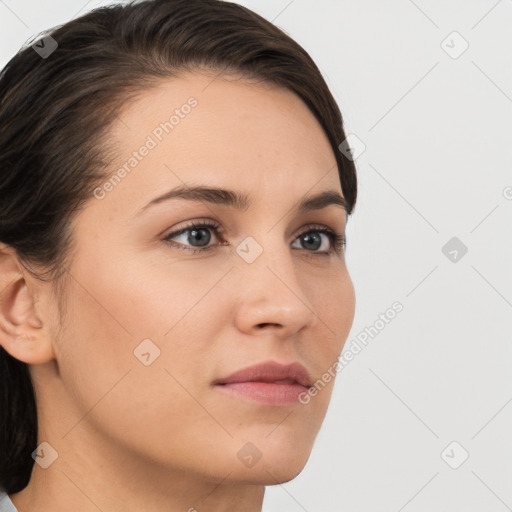 Neutral white young-adult female with medium  brown hair and brown eyes