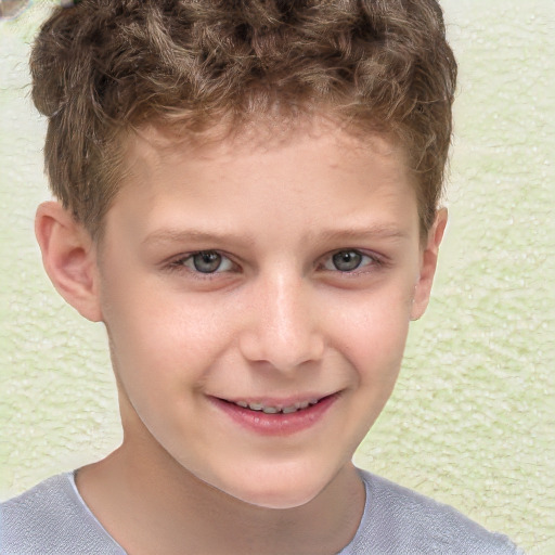 Joyful white child male with short  brown hair and brown eyes