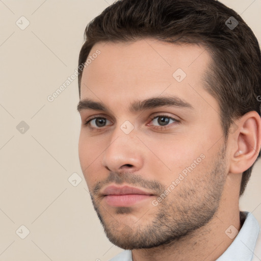 Neutral white young-adult male with short  brown hair and brown eyes