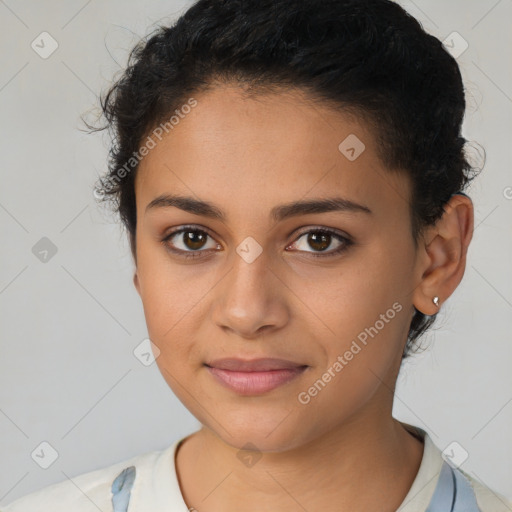 Joyful latino young-adult female with short  brown hair and brown eyes