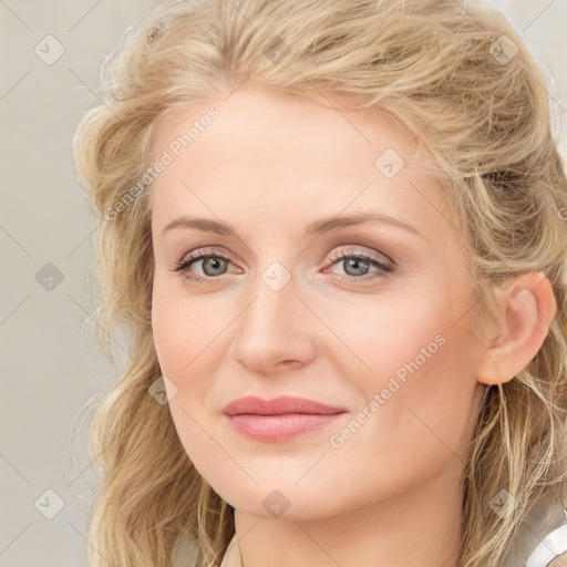 Joyful white young-adult female with long  brown hair and blue eyes