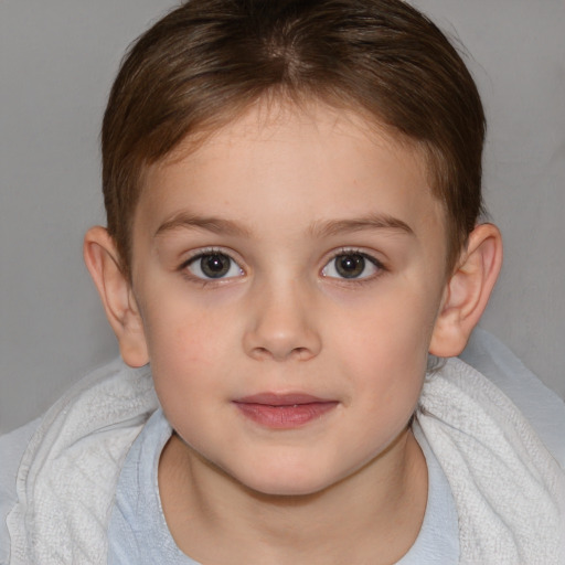 Joyful white child female with medium  brown hair and brown eyes