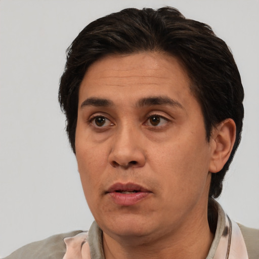 Neutral white adult male with short  black hair and brown eyes