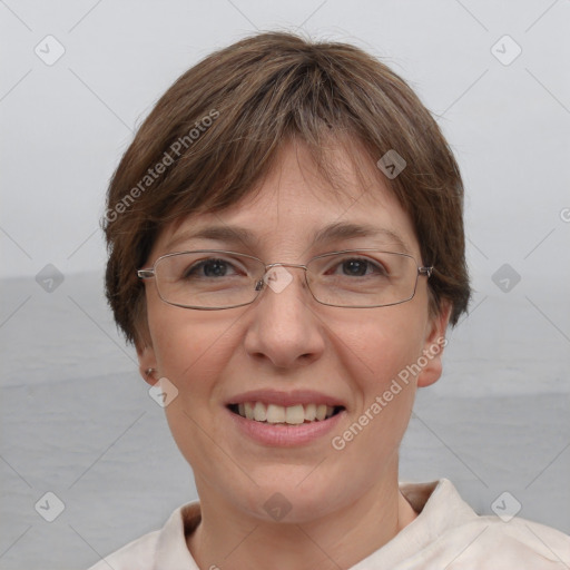 Joyful white adult female with short  brown hair and brown eyes