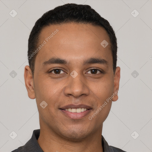 Joyful white young-adult male with short  black hair and brown eyes