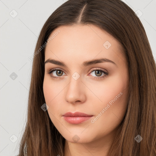 Neutral white young-adult female with long  brown hair and brown eyes