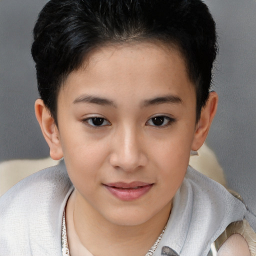 Joyful white child female with short  brown hair and brown eyes