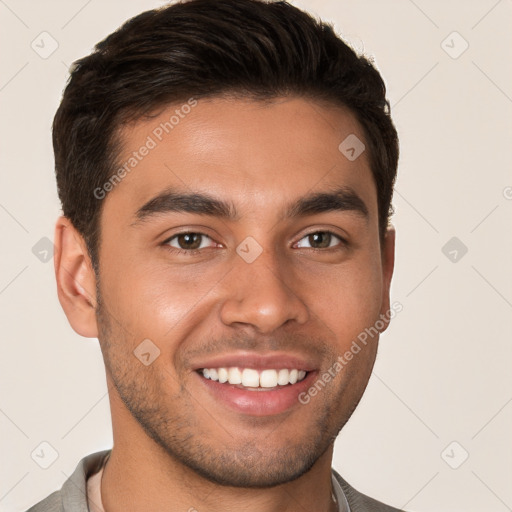 Joyful white young-adult male with short  brown hair and brown eyes