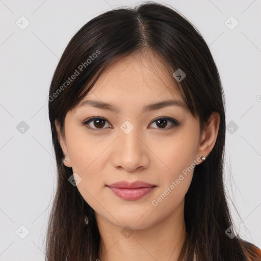 Joyful asian young-adult female with long  brown hair and brown eyes