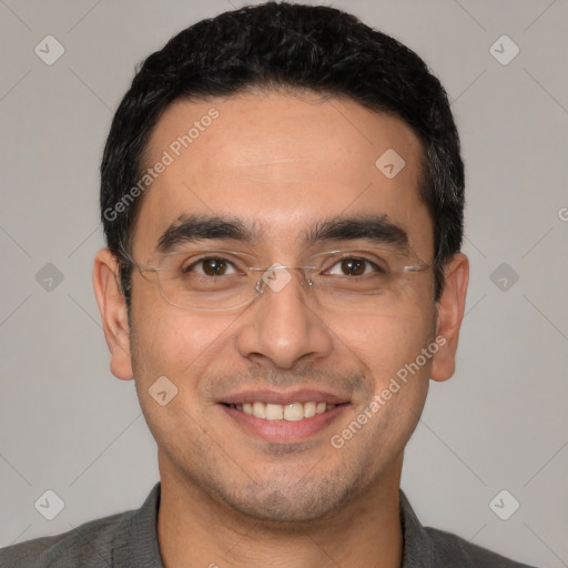 Joyful white young-adult male with short  black hair and brown eyes
