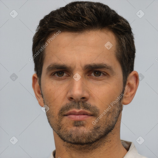 Neutral white adult male with short  black hair and brown eyes