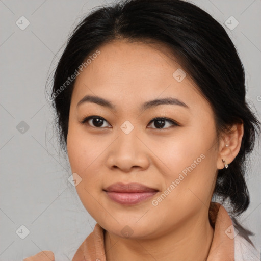 Joyful asian young-adult female with medium  brown hair and brown eyes