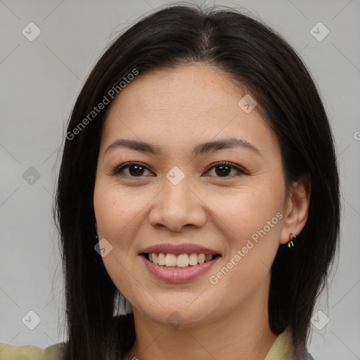 Joyful latino young-adult female with medium  brown hair and brown eyes