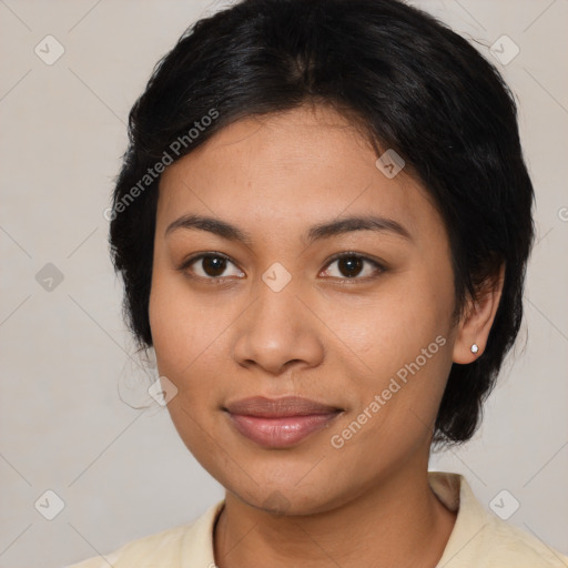 Joyful latino young-adult female with medium  brown hair and brown eyes