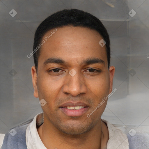 Joyful white young-adult male with short  black hair and brown eyes