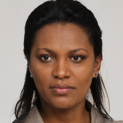 Neutral black young-adult female with long  black hair and brown eyes