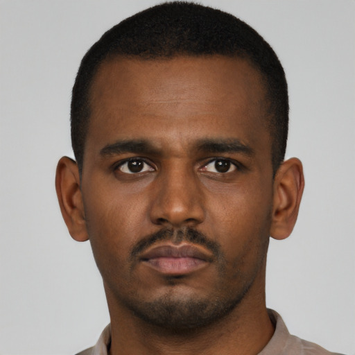 Neutral latino young-adult male with short  brown hair and brown eyes