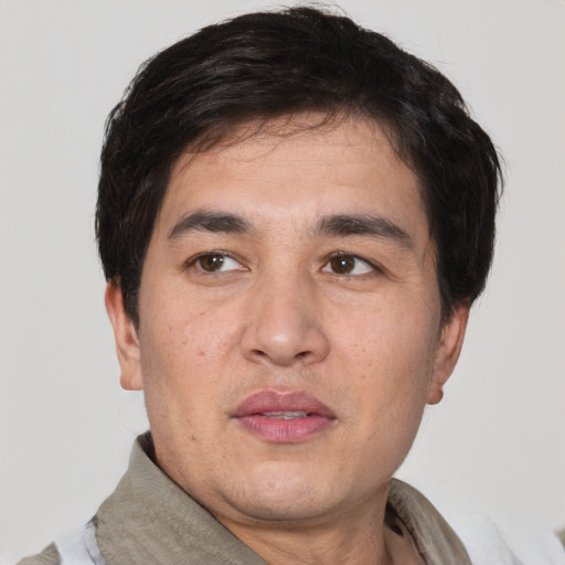 Neutral white adult male with short  black hair and brown eyes