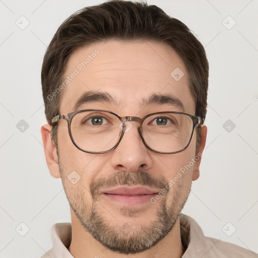 Joyful white adult male with short  brown hair and brown eyes