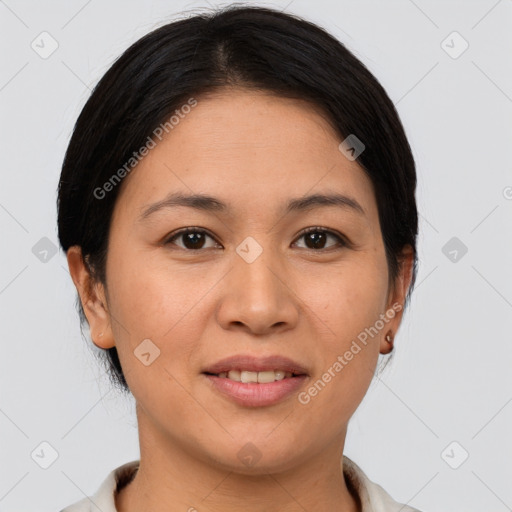 Joyful asian young-adult female with short  brown hair and brown eyes