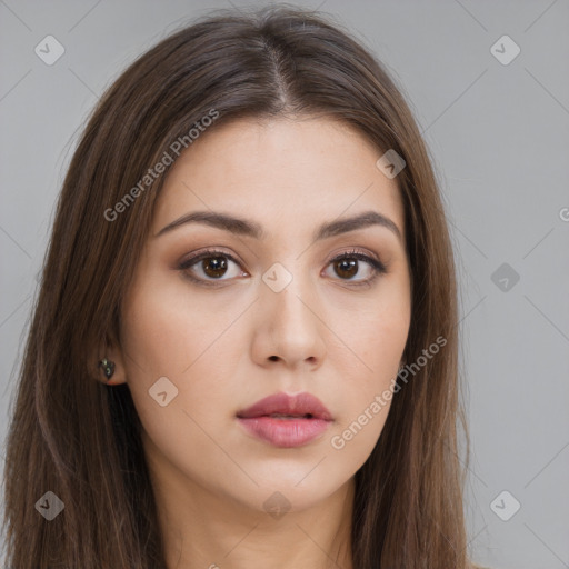 Neutral white young-adult female with long  brown hair and brown eyes