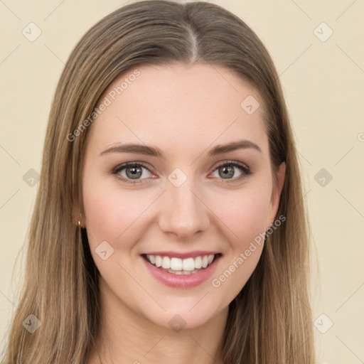 Joyful white young-adult female with long  brown hair and green eyes