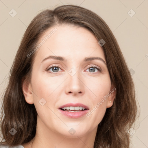 Joyful white young-adult female with medium  brown hair and green eyes