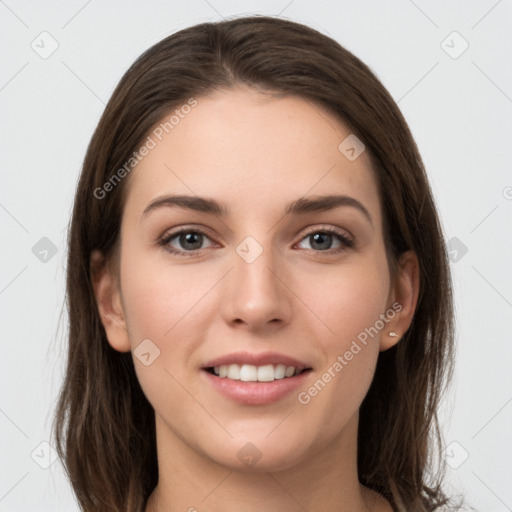 Joyful white young-adult female with long  brown hair and grey eyes