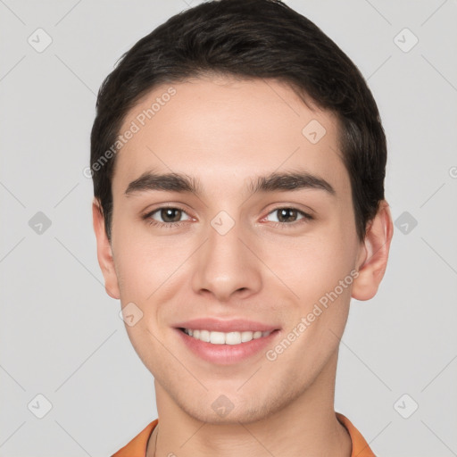 Joyful white young-adult male with short  brown hair and brown eyes