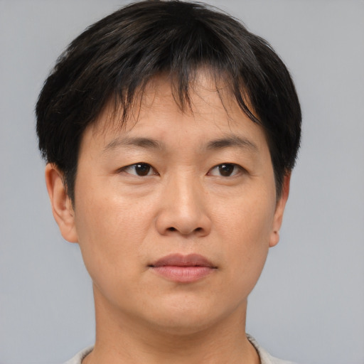 Neutral asian young-adult female with short  brown hair and brown eyes