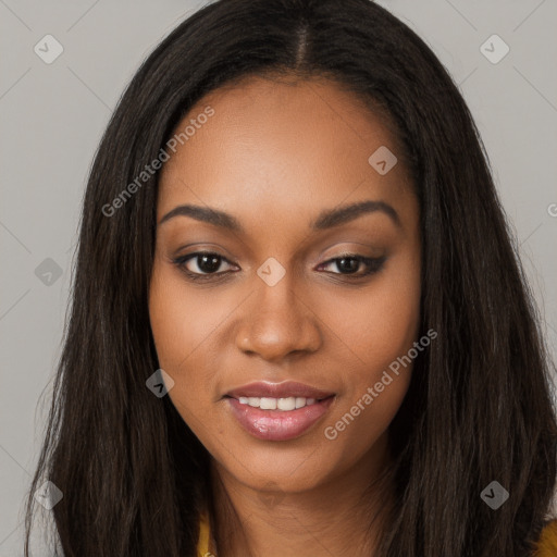 Joyful black young-adult female with long  brown hair and brown eyes