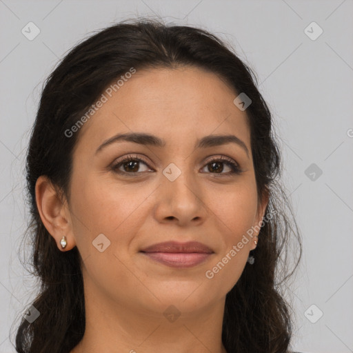 Joyful latino young-adult female with long  brown hair and brown eyes