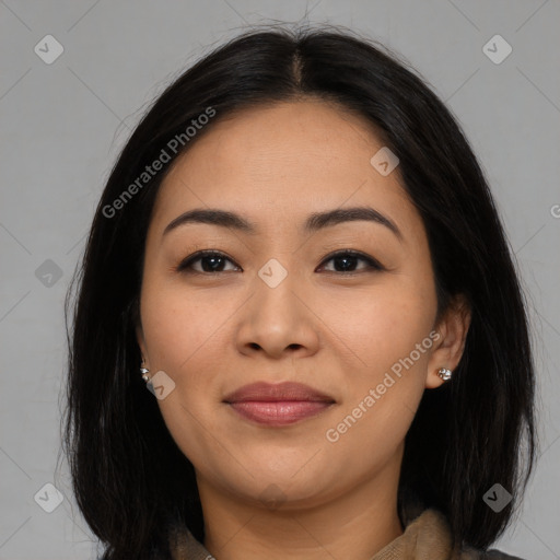 Joyful asian young-adult female with medium  brown hair and brown eyes