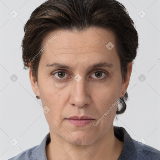 Joyful white adult male with short  brown hair and grey eyes