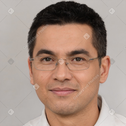 Joyful white adult male with short  black hair and brown eyes