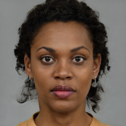 Neutral black young-adult female with short  brown hair and brown eyes