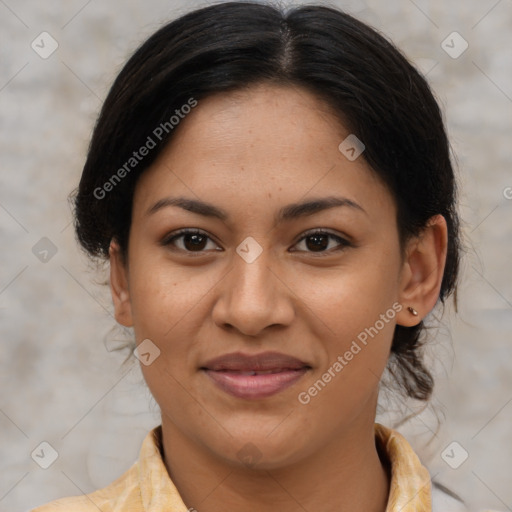 Joyful latino young-adult female with medium  brown hair and brown eyes