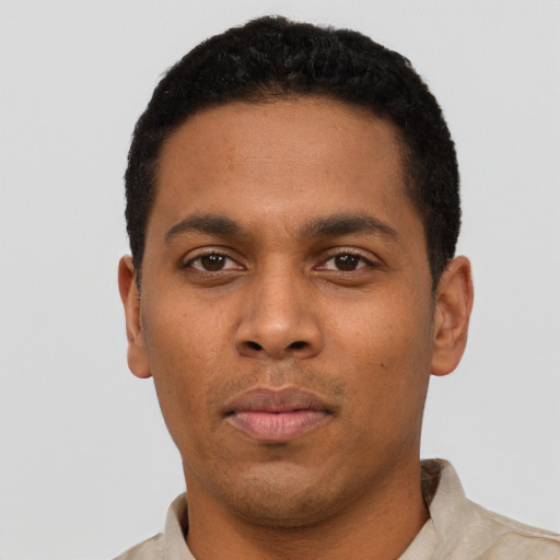 Neutral black young-adult male with short  black hair and brown eyes