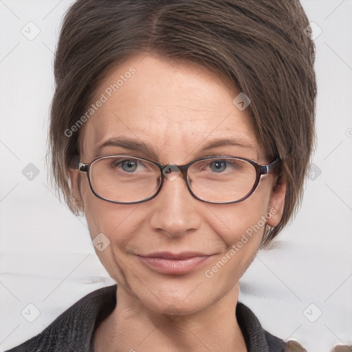 Joyful white adult female with medium  brown hair and grey eyes