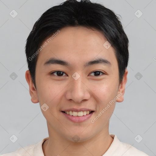 Joyful asian young-adult male with short  black hair and brown eyes