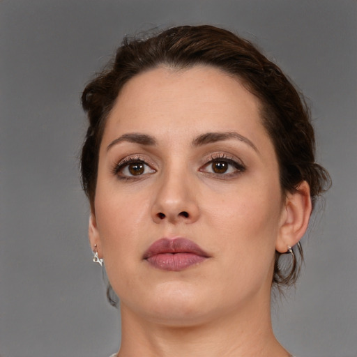 Neutral white young-adult female with medium  brown hair and brown eyes