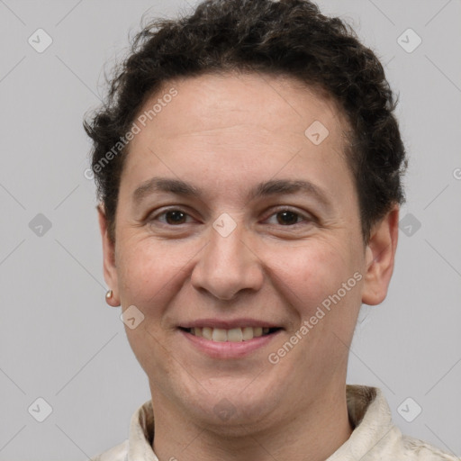 Joyful white adult male with short  brown hair and grey eyes